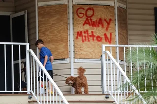 home boarded up for milton