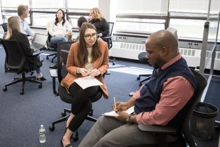 Charity Navigator team in discussion