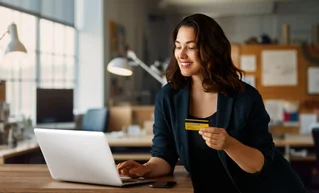 Woman donating online, using her laptop